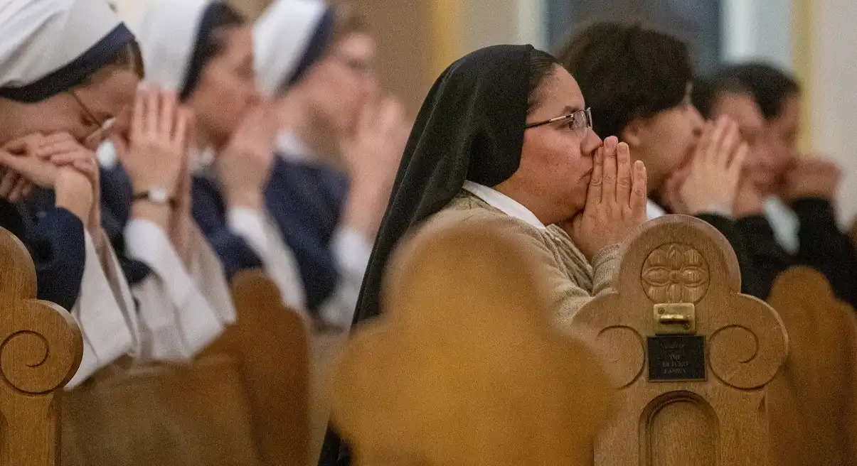 sisters praying in church