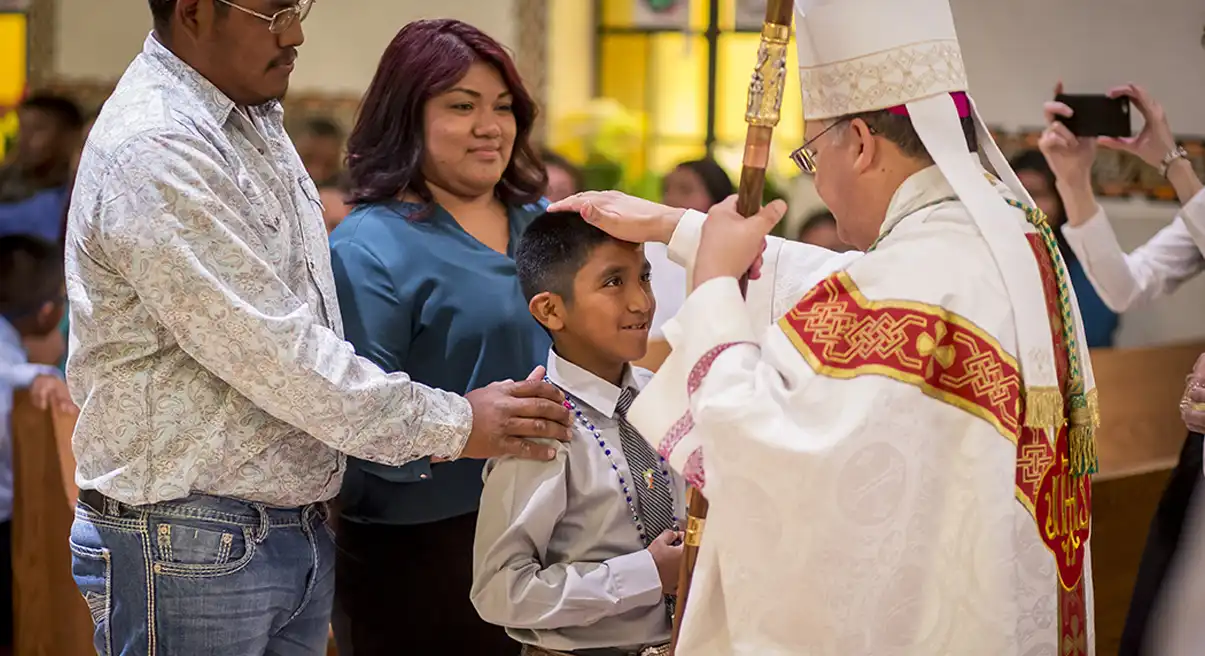young man receiving conformation