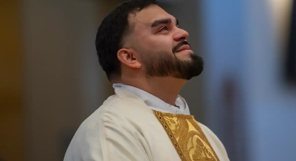 Seminarian looking up