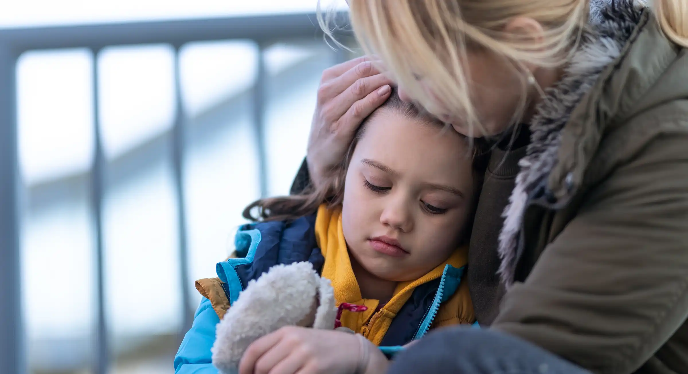 Mother with daughter hugging