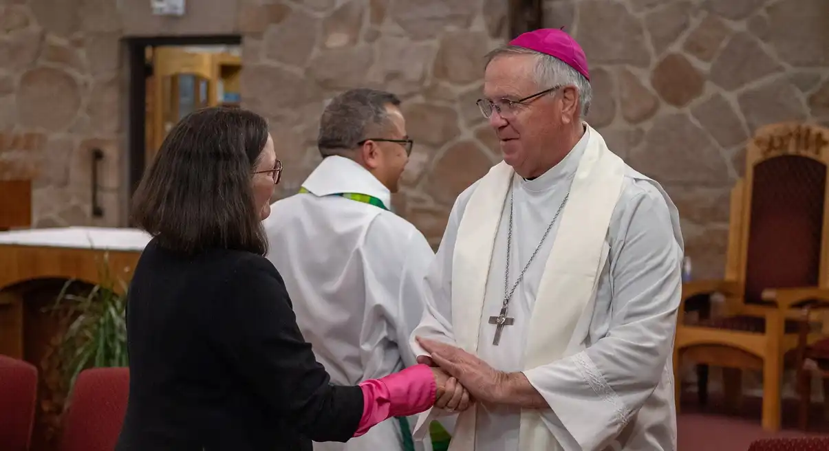 Bishop John Dolan and religious leader.