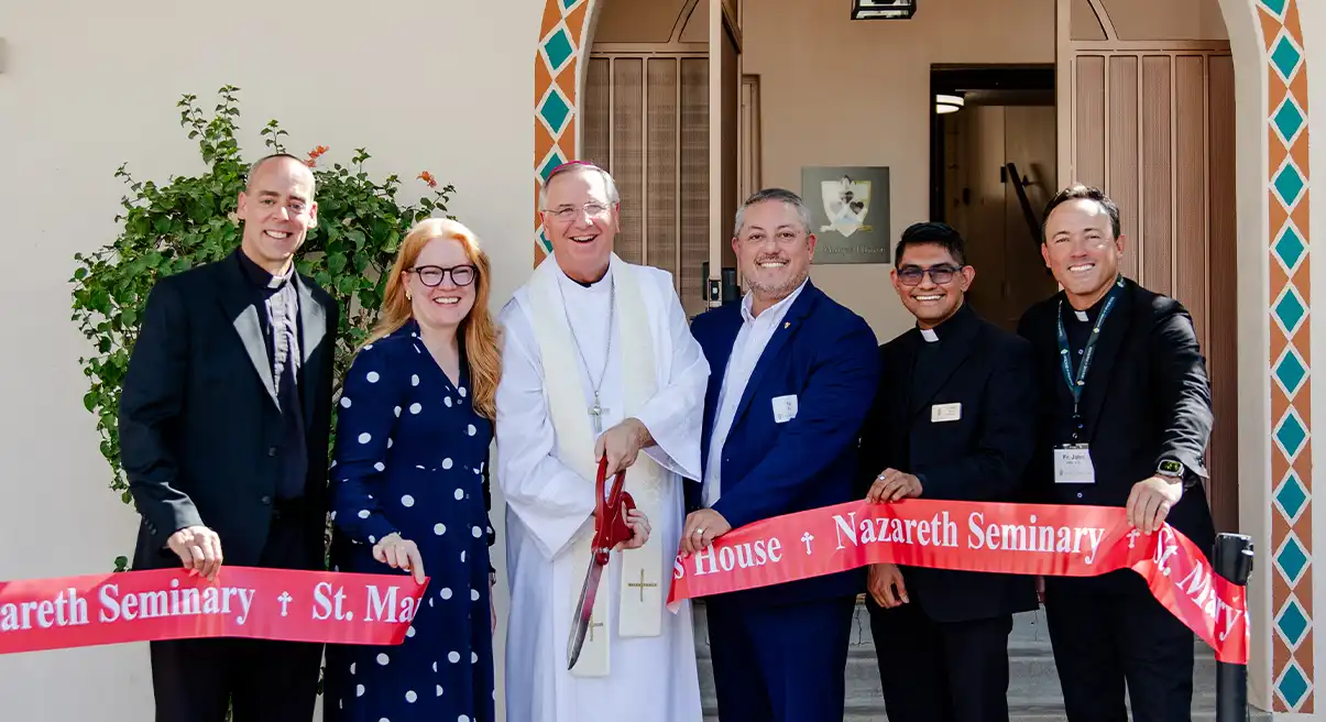 group photo w/ Bishop John Dolan of ribbon cutting of St. Mary's House
