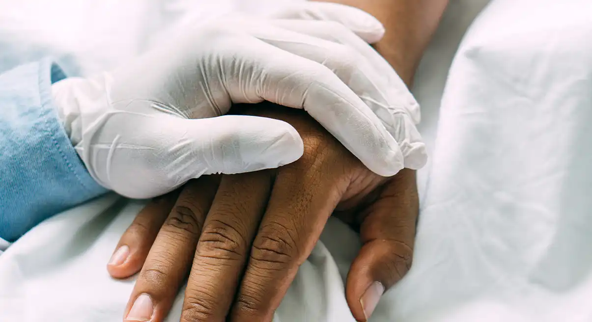 holding hand of the sick