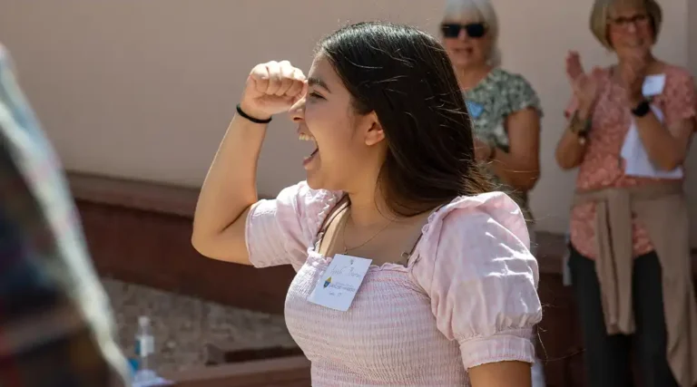 Young Adult Celebrating a Win