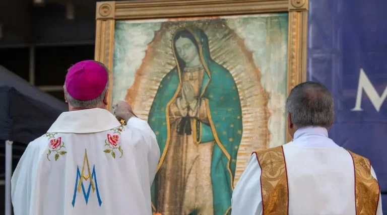 Bishop facing our Lady