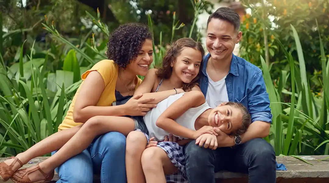 Family photo. Smiles all around.
